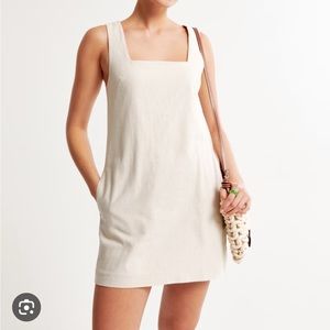 Linen blend wide strap mini dress. White.